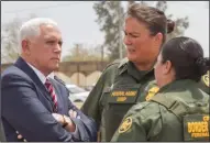  ?? JOHN GIBBINS/SAN DIEGO UNION-TRIBUNE ?? Vice President Mike Pence listened to acting Border Patrol Chief Carla Provost, center, and Gloria Chavez, Chief Patrol Agent for the El Centro Sector, right, at the site where a stretch of fence is being replaced with a much taller designed barrier, on April 30.