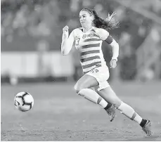  ?? — Gambar AFP ?? CEMERLANG: Morgan ketika beraksi bersama AS pada aksi perlawanan akhir CONCACAF Wanita di Texas pada 16 Oktober 2018.