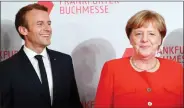  ?? IANS ?? German Chancellor Angela Merkel (right) and French President Emmanuel Macron.