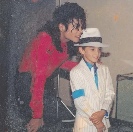  ??  ?? Michael Jackon with child prodigy Wade Robson in the early ’90s and (below from left) Robson in 2005; with documentar­y maker Dan Reed and James Safechuck promoting Leaving Neverland this year; and performing as his idol before leaving for the US