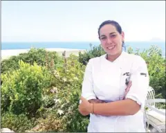  ?? AFP ?? Martina Caruso poses outdoor at her restaurant in Salina, one of the Eolian sicilian islands.