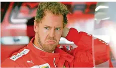  ?? FOTO: BOLAND/DPA ?? Sebastian Vettels Verbleib in der Formel 1 ist keineswegs sicher.