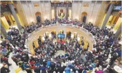  ??  ?? People crowd the rotunda of the State Capitol in St. Paul during a Minnesota Citizens Concerned for Life rally in January, marking the 45th anniversar­y of the Roe v. Wade decision. John Autey, Pioneer Press