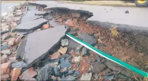  ??  ?? An example of the sort of damage caused in various locations in the Highlands was this road at Applecross.