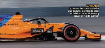  ??  ?? AL VOLANTE La carrera fue como todas las que disputó, intentando sacar el máximo de su McLaren, y estuvo cerca de puntuar.