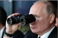  ?? (AP/Sputnik/Alexei Nikolsky) ?? Russian President Vladimir Putin watches military exercises near Orenburg, Russia, in Septenber 2019.