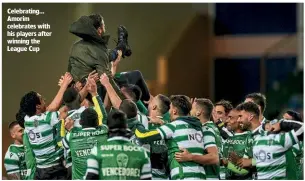  ??  ?? Celebratin­g… Amorim celebrates with his players after winning the League Cup