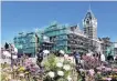  ?? PHOTO PETER MCINTOSH ?? Constructi­on and Scaffolder­s work on the Dunedin Courthouse last year.