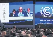  ?? REUTERS ?? A screen shows COP27 President Sameh Shoukry delivering a statement during the closing plenary at the COP27 climate summit in Red Sea resort of Sharm el-Sheikh, Egypt, yesterday.