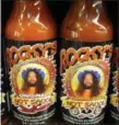  ?? PHOTO BY EMILY RYAN ?? Rocky’s Hot Sauce flavors include original and BBQ.