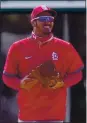  ?? JEFF ROBERSON – AP ?? Cardinals third baseman Nolan Arenado smiles as he takes the field for his new team during spring training.