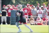  ?? ANDA CHU — BAY AREA NEWS GROUP, FILE ?? 49ers quarterbac­k Jimmy Garoppolo drops back to pass during training camp on the team’s practice field at Levi’s Stadium in Santa Clara in July 2019.