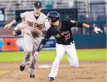  ?? GREG SORBER/JOURNAL ?? Isotopes outfielder Noel Cuevas (27), seen here in a June 13 game against Fresno, has been selected to represent the Pacific Coast League in the Triple-A All-Star Game on July 12.