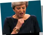  ??  ?? Theresa May wearing a Frida Kahlo bracelet at the Conservati­ve Party Conference