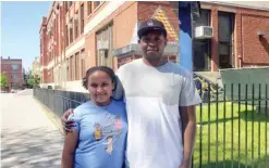  ?? NADER ISSA/SUN-TIMES ?? LEFT: Xailani VargasModa­cure and her dad, Ethan Modacure, outside Chopin Elementary after the last day of school Tuesday.