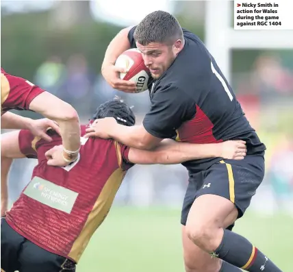  ??  ?? > Nicky Smith in action for Wales during the game against RGC 1404