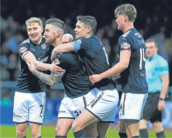  ?? Pictures: SNS Group. ?? Left: Dundee debutant Simon Murray keeps his eye on the ball as he is closed down by County’s Marcus Fraser; above: Kerr Waddell, second left, celebrates his equaliser with A-jay Leitch-smith, Darren O’dea and Mark O’hara.