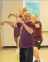  ?? DIGITAL FIRST MEDIA FILE PHOTO ?? Charles Brynan, of Pear Garden Tai Chi & Reflexolog­y, leads a morning Tai Chi class at the Pottstown YMCA.