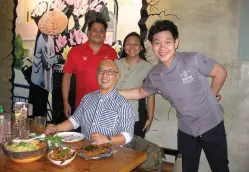  ??  ?? CHEF Patrick with lunch guests at Asian Cow Paolo & Janet Tancontian and Michael E. Dakudao