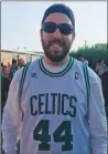  ??  ?? Mike Violette, of N. Attleboro, sports a Danny Ainge jersey.