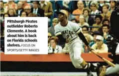  ?? FOCUS ON SPORTS/GETTY IMAGES ?? Pittsburgh Pirates outfielder Roberto Clemente. A book about him is back on Florida schools shelves.