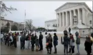  ?? JACQUELYN MARTIN—THE ASSOCIATED PRESS ?? People stand in line to enter the Supreme Court, Wednesday, March 28, 2018, in Washington, where the court will hear arguments on a gerrymande­ring case.