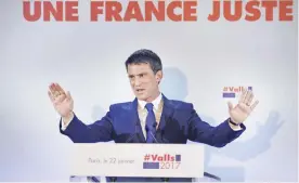  ?? — AFP ?? PARIS: Former prime minister and candidate for the left-wing primaries, Manuel Valls gestures before speaking following the first round of the left-wing primary for the 2017 French presidenti­al election.