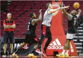  ?? Mark Mulligan / Staff photograph­er ?? The Rockets have pushed back reopening Toyota Center to players until at least May 18, but there will be restrictio­ns on how many can be on the court at a time.