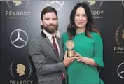  ?? Astrid Stawiarz Getty I mages ?? ANDY MILLS and Rukmini Callimachi receive a Peabody Award for “Caliphate” in May 2019.