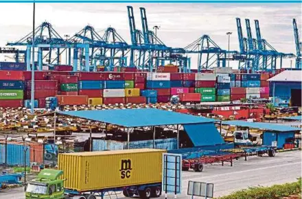 ?? FILE PIC ?? MIDF Amanah Investment Bank Bhd has revised its full-year export and import growth forecasts for Malaysia to 16.9 and 19.2 per cent, respective­ly.