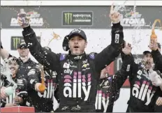  ?? AP file photo ?? Seven-time NASCAR champion Jimmie Johnson has been cleared to race after testing negative for the coronaviru­s Monday and Tuesday.