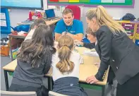  ??  ?? Lady Ainslie, right, wife of Olympic sailor Sir Ben, visits a school in her role as an ocean ambassador