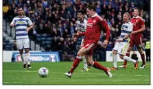  ??  ?? DECISIVE: McLean slots home the second goal for Aberdeen in their 2-0 semi-final win over Morton in the Betfred Cup last month
