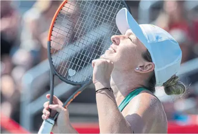  ?? PAUL CHIASSON/THE CANADIAN PRESS ?? Top seed Simona Halep beat Australian Ashleigh Barty on Saturday and will face American Sloane Stephens in the Montreal final.