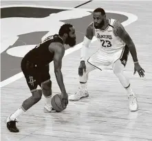  ?? Mike Ehrmann / Getty Images ?? James Harden and LeBron James were the ultimate floor generals, but Rajon Rondo made the difference for the Lakers.