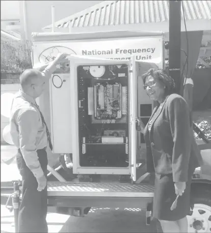  ??  ?? Minister of Public Telecommun­ications Catherine Hughes (right) and Director of the National Frequency Management Unit (NFMU) Valmikki Singh at the commission­ing of the three frequency monitoring stations yesterday. Pictured above is the transporta­ble...