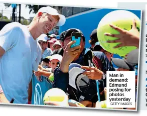  ?? GETTY IMAGES ?? Man in demand: Edmund posing for photos yesterday