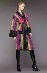  ??  ?? Belted wrap coat, designed by Duro Olowu, Autumn/Winter 2015, England. © Duro Olowu