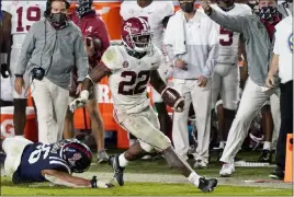  ?? Rogelio V. Solis The Associated Press ?? Alabama running back Najee Harris will test Georgia’s defense, one that has been very good against the run this season, when the two teams meet on Saturday.