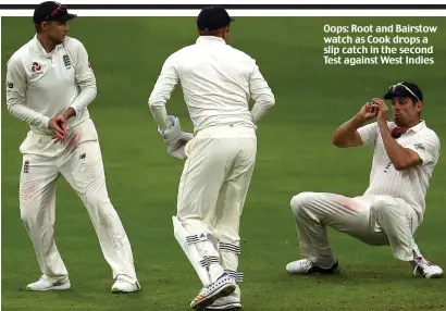  ??  ?? Oops: Root and Bairstow watch as Cook drops a slip catch in the second Test against West Indies