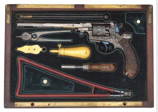  ?? ?? A cased Russian 54-bore percussion revolver, whose butt is carved as a lion’s head complete with teeth, went under the hammer for £60,000