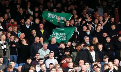  ?? ?? Newcastle United fans with Saudi Arabia flags before their game at Crystal Palace in October 2021. Photograph: Matthew Childs/Action Images/Reuters