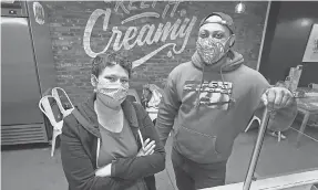  ?? SAM UPSHAW JR./ USA TODAY NETWORK ?? Darryl Goodner, right, co- owner of Louisville Cream, and manager Kelly Nusz in Louisville, Ky. They co- host the Butter Pecan podcast about the link between racism and food.