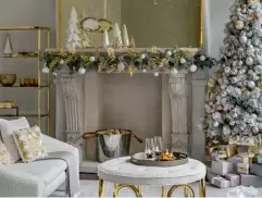  ?? Pic: PA Photo/Amara ?? Elegant festive setting designed by Amara
Faux Pinecone Christmas Swag