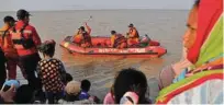  ?? - Reuters file photo ?? RESCUE OPERATION: People watching rescue team members heading to the Lion Air, flight JT610, sea crash site off the coast of Karawang regency, West Java province, Indonesia.