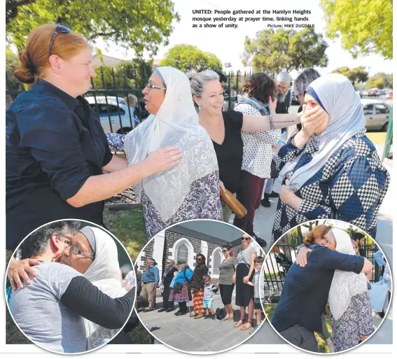  ?? Picture: MIKE DUGDALE ?? UNITED: People gathered at the Hamlyn Heights mosque yesterday at prayer time, linking hands as a show of unity.