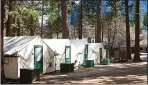 ?? ?? Curry Village’s location right beneath Half Dome in Yosemite Valley makes it a perfect spot to get your glamping on. Tent cabins with shared bathrooms are most abundant, but you can also upgrade to hard-sided cabins at Curry Village with or without private bathrooms.