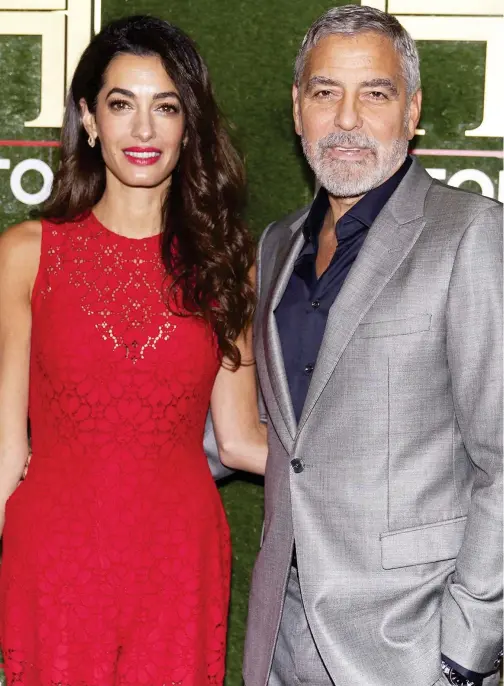  ?? Associated Press ?? Amal Clooney (left) and George Clooney arrive at HISTORYTAL­KS on Saturday at DAR Constituti­on Hall in Washington.