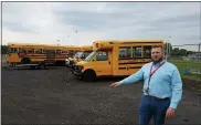  ?? DAN SOKIL — MEDIANEWS GROUP ?? North Penn School District Coordinato­r of Transporta­tion Nick Kraynak points in May 2019to a gravel lot between North Penn High School and the school’s athletic fields which was subsequent­ly converted into a fueling station for new propane buses.