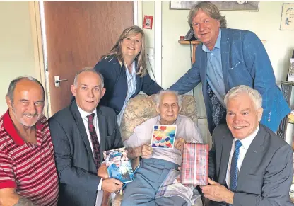  ??  ?? Jimmy Sinclair is joined by, from left, his carer Archie Howie, Deputy Lieutenant of Fife Jim Kinloch, Councillor Carol Lindsay, David Torrance MSP and Fife Council’s armed forces champion Councillor Rod Cavanagh.